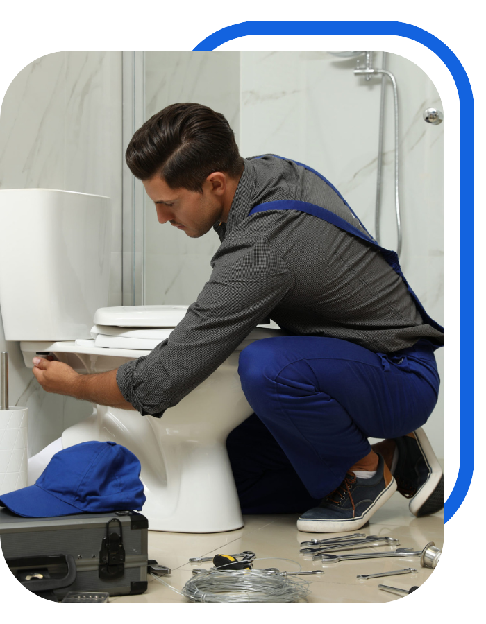 Toilet Leakage Solutions worker fixing 